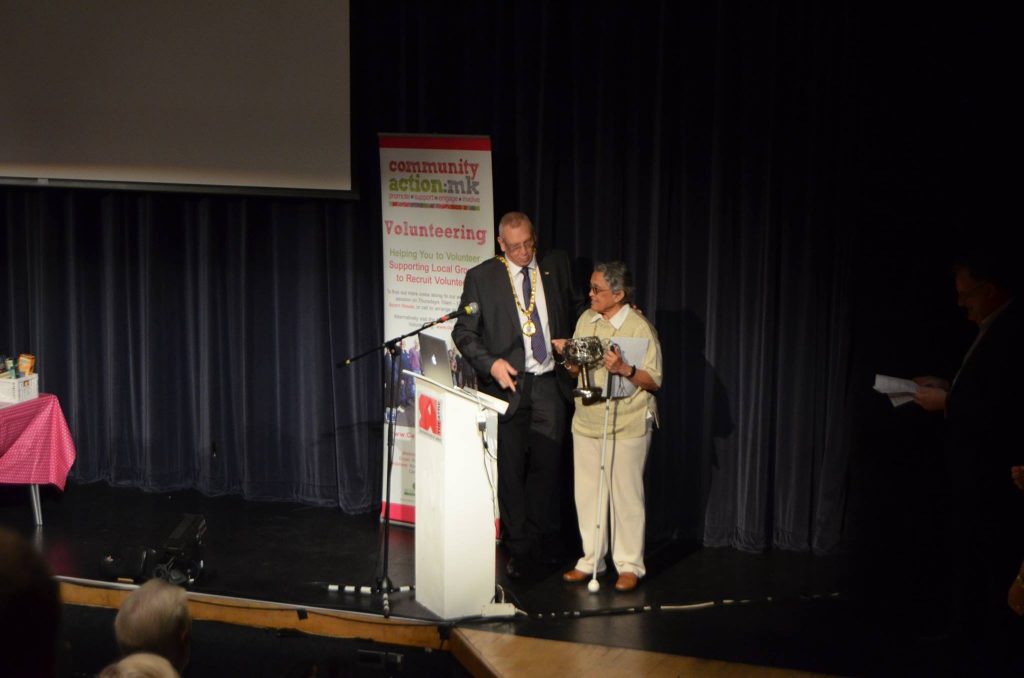 Our MK project leaders win awards - Padma Cheriyan accepting her award photo colour