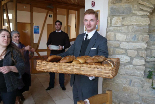 crowdfunding workshop man holding a basket of bread photograph colour