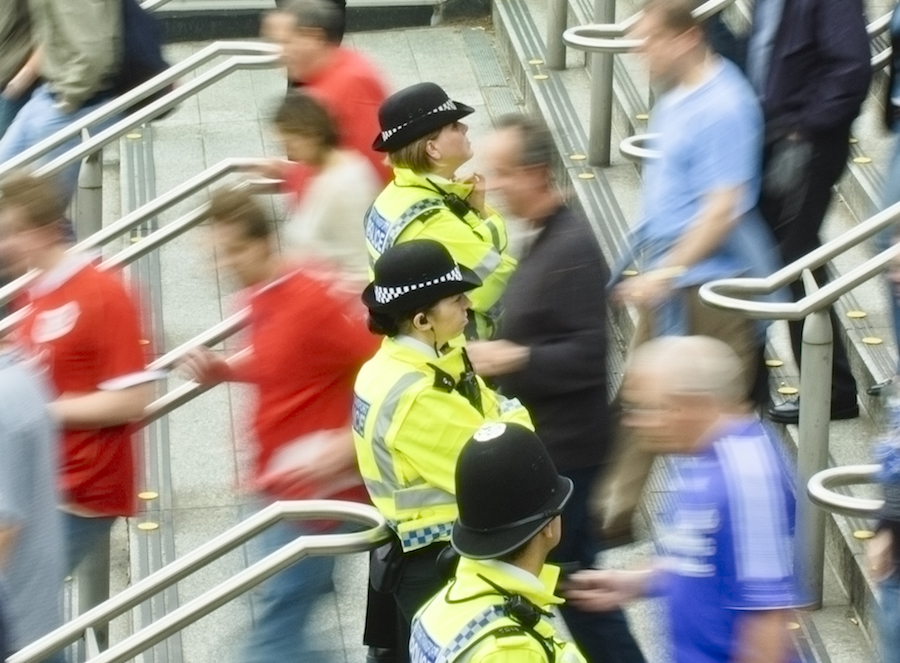 British Police Outside Tube Station colour