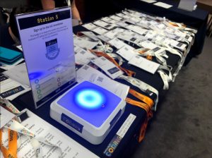 IoC Conference 2020 - Attendee lanyard collection table with blockchain badging station